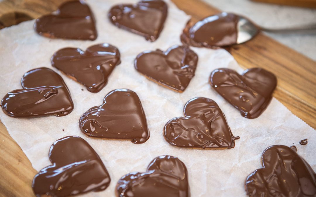 Ginger snaps hearts dipped in chocolate